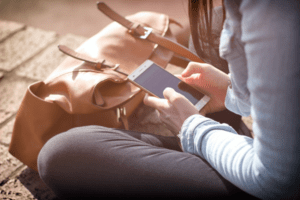 mobile app girl holding phone