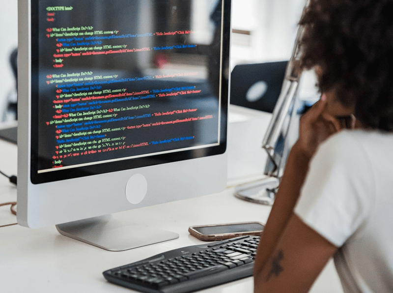 lady at computer sat at desk